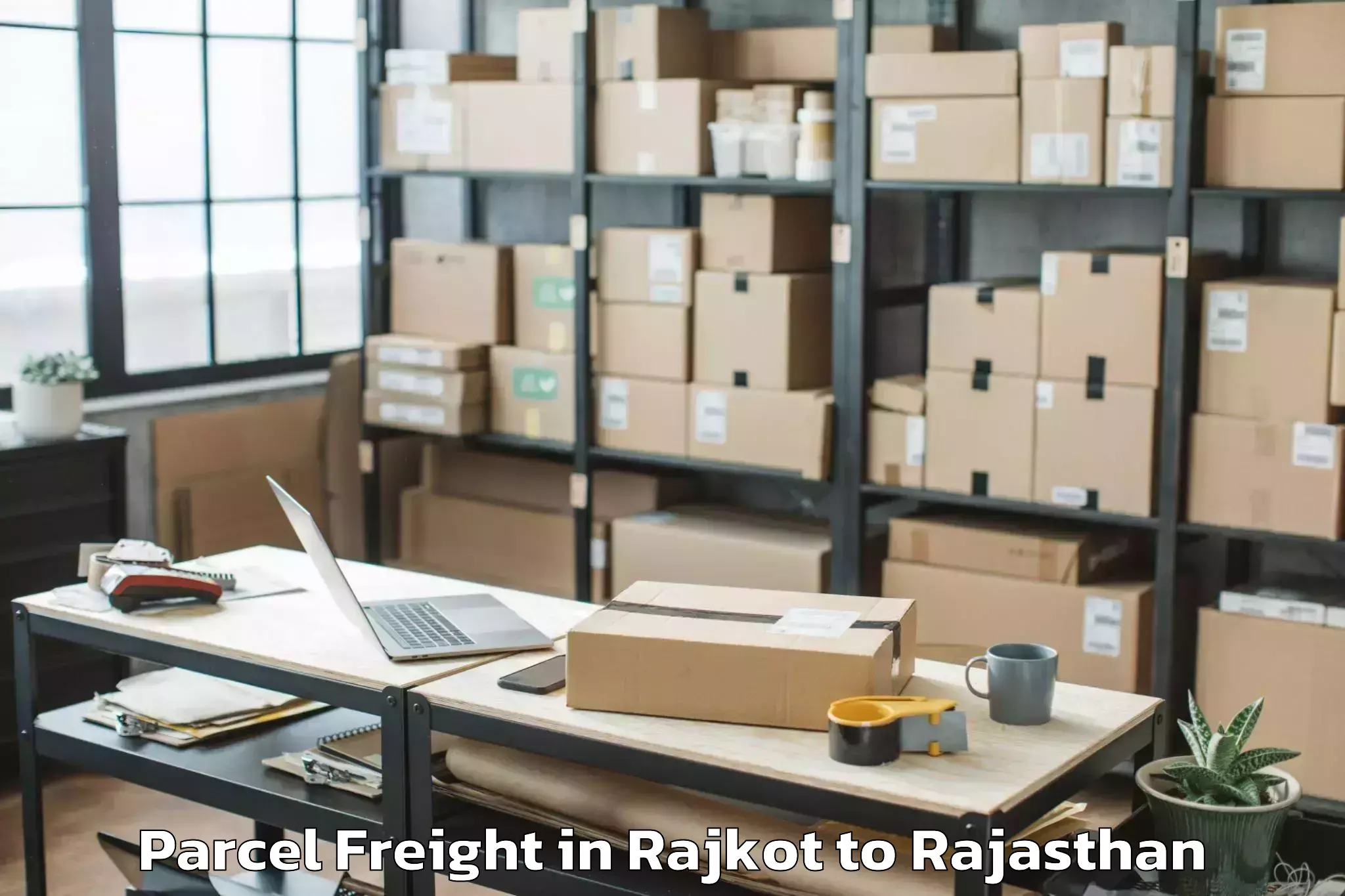 Reliable Rajkot to Maharaja Surajmal Brij Univers Parcel Freight